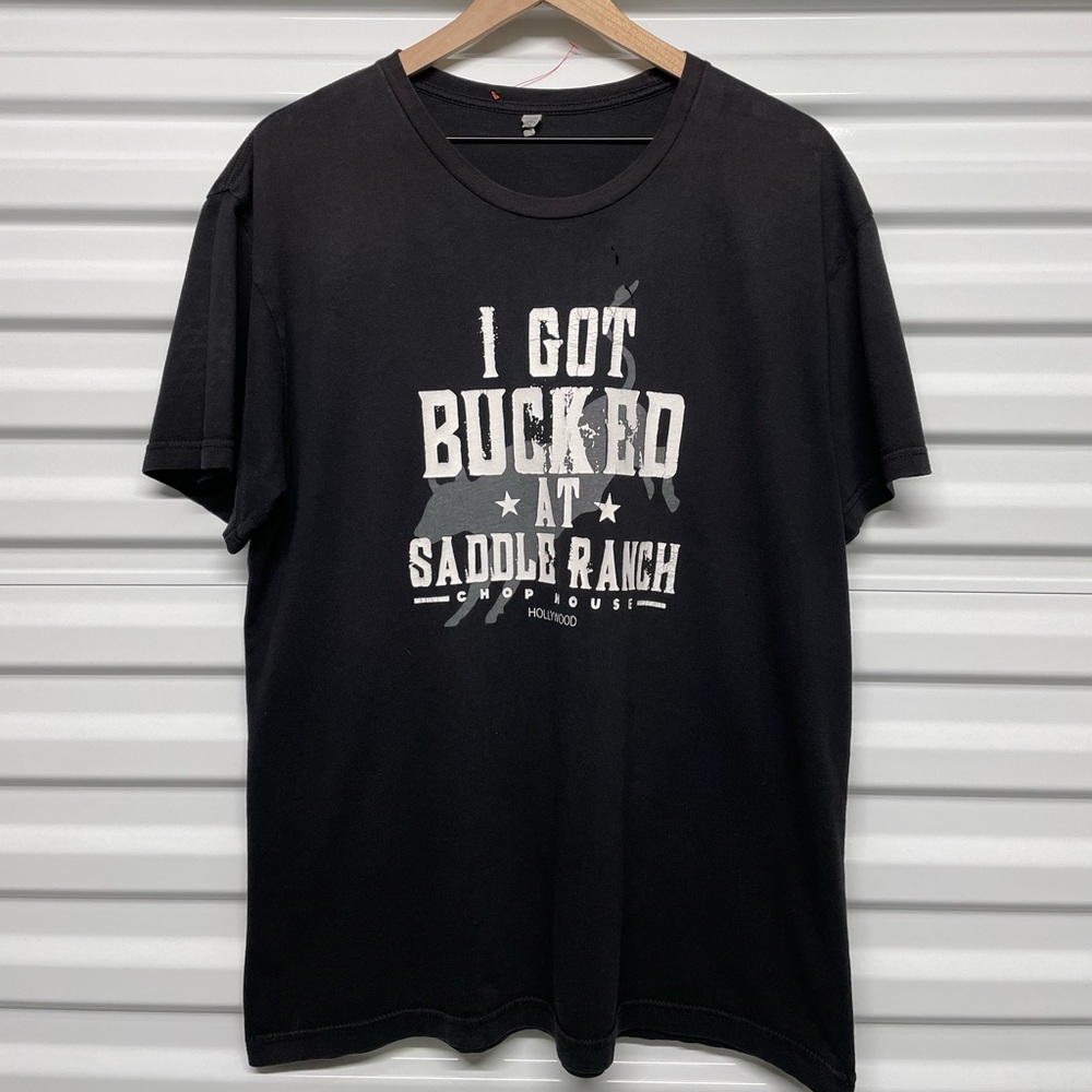 Vintage “I Got Bucked At Saddle Ranch” Tee